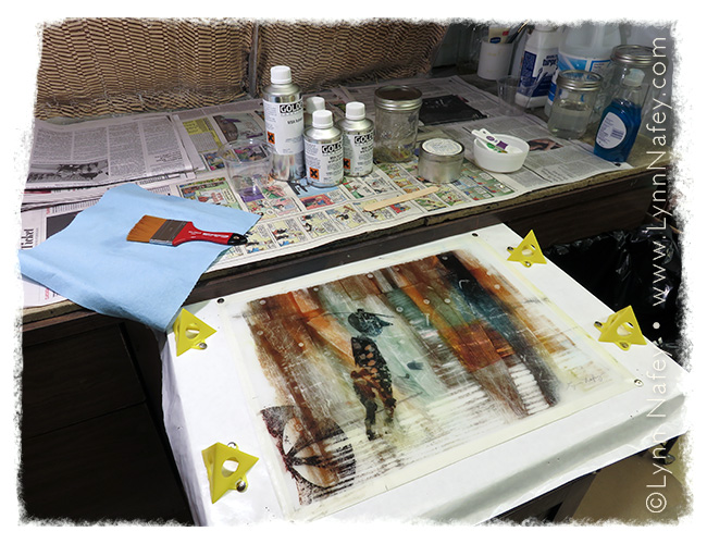 Lynn Nafey - preparing to varnish her mixed media work