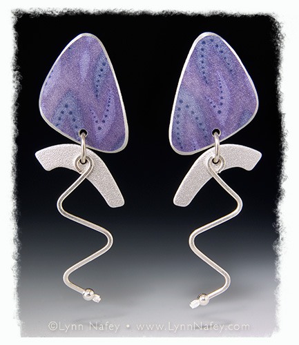 Earrings made with painted metal, aluminum, and sterling silver 